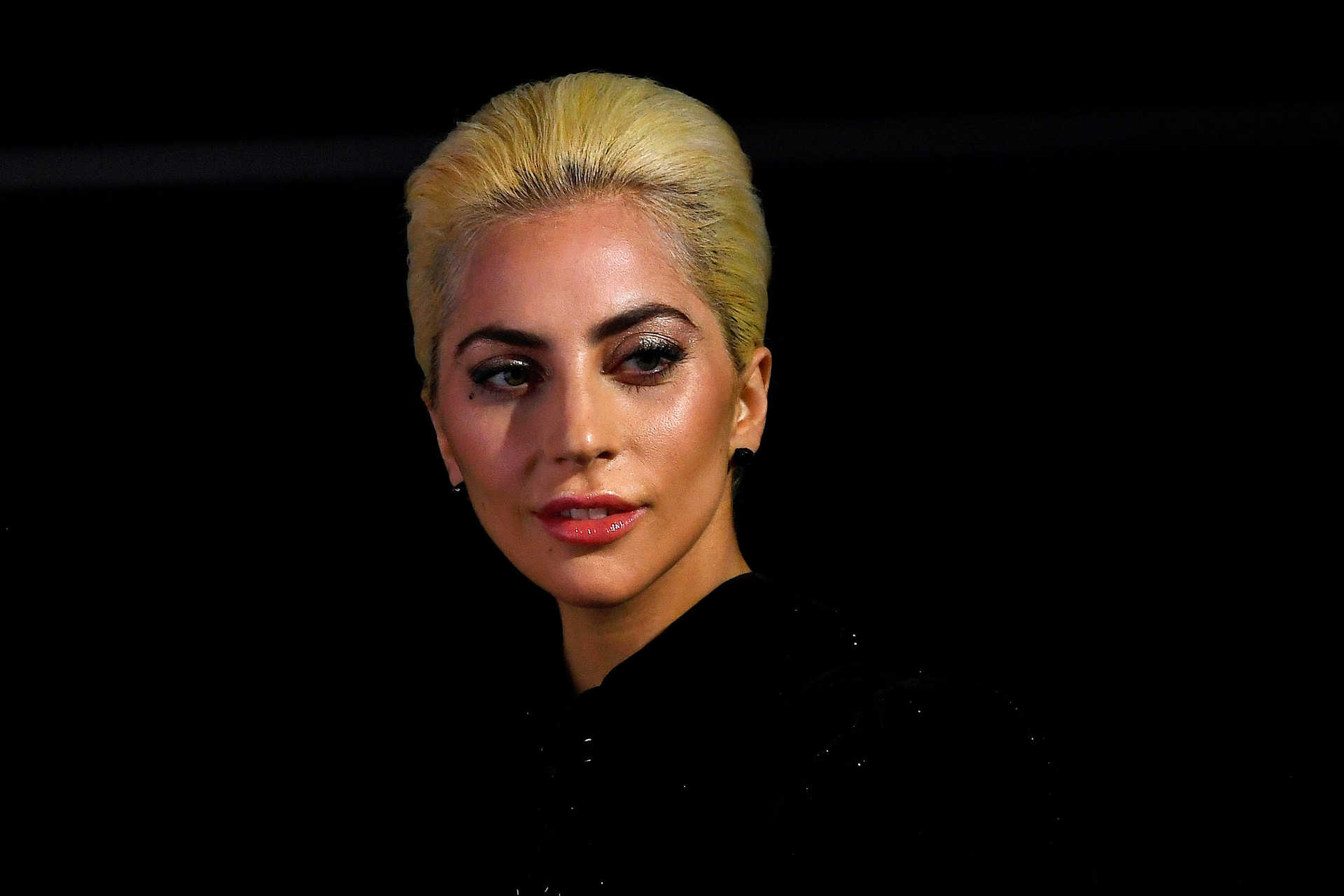 Musician Lady Gaga arrives to promote her new album 'Joanne' before singing at a private gig at Westfield Shopping Centre in London, Britain December 1, 2016. REUTERS/Dylan Martinez