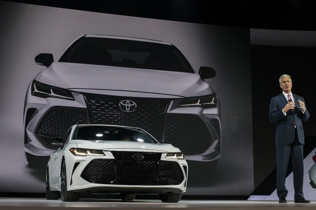 Jack Hollis, group vice-president and general manager Toyota division, introduces the 2019 Toyota Avalon during the press preview at the 2018 North American International Auto Show (NAIAS) in Detroit, Michigan, on January 15, 2018. - The Detroit Auto Show got rolling on January 14, with international trade and tax cuts dominating the conversation, even as carmakers raced to meet Americans' seemingly insatiable appetite for trucks and SUVs. (Photo by Jewel SAMAD / AFP)