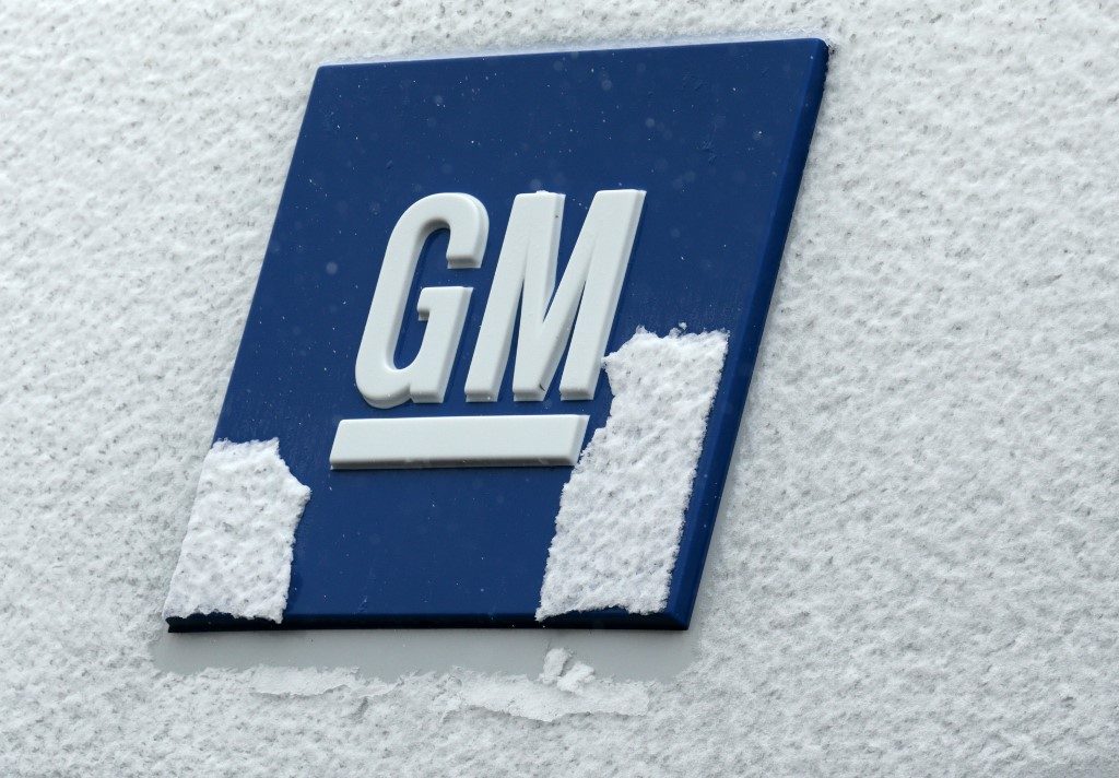 A sign is seen at General Motors as they announced the closing of multiple facilities including the Warren Transmission Operations on November 26, 2018 in Warren, Michigan. - In a massive restructuring, US auto giant General Motors announced Monday it would cut 15 percent of its workforce to save $6 billion and adapt to "changing market conditions." The moves include shuttering seven plants worldwide as the company responds to changing customer preferences and focuses on popular trucks and SUVs and increasingly on electric models.GM will shutter three North American auto assembly plants next year: the Oshawa plan in Ontario, Canada; Hamtramck in Detroit, Michigan and Lordstown in Warren, Ohio.In addition, it will close propulsion plants -- which produce batteries and transmissions -- in Baltimore, Maryland and Warren, Michigan, as well two more unidentified plants outside of North America. (Photo by JEFF KOWALSKY / AFP)